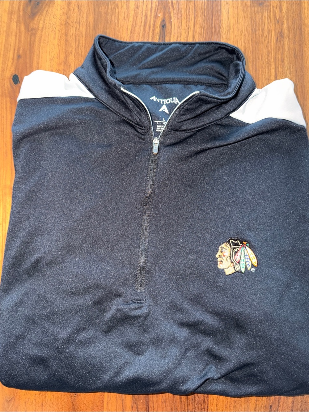 Antigua Black Quarter-Zip Pullover with Gray Shoulder Accents and Team Crest